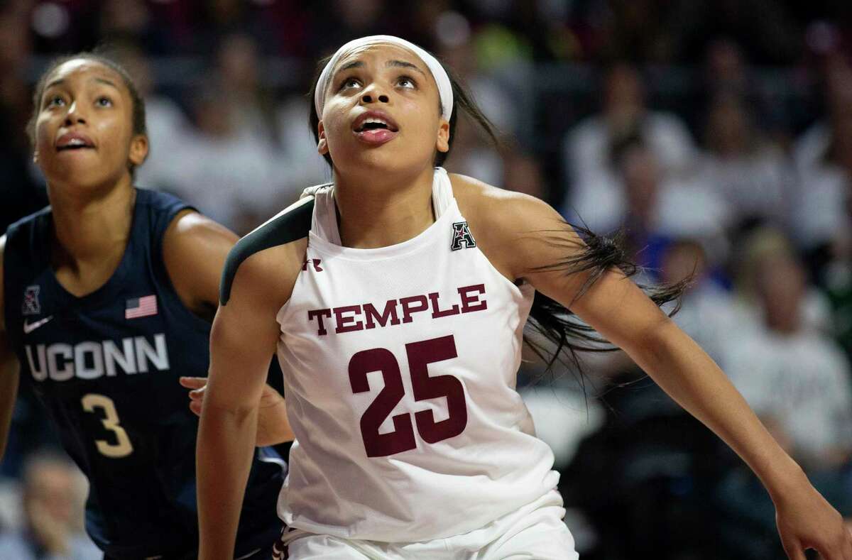 Temple forward Mia Davis (25) in action during an NCAA college basketball game against Connecticut Sunday, Nov. 17, 2019, in Philadelphia. (AP Photo/Laurence Kesterson)