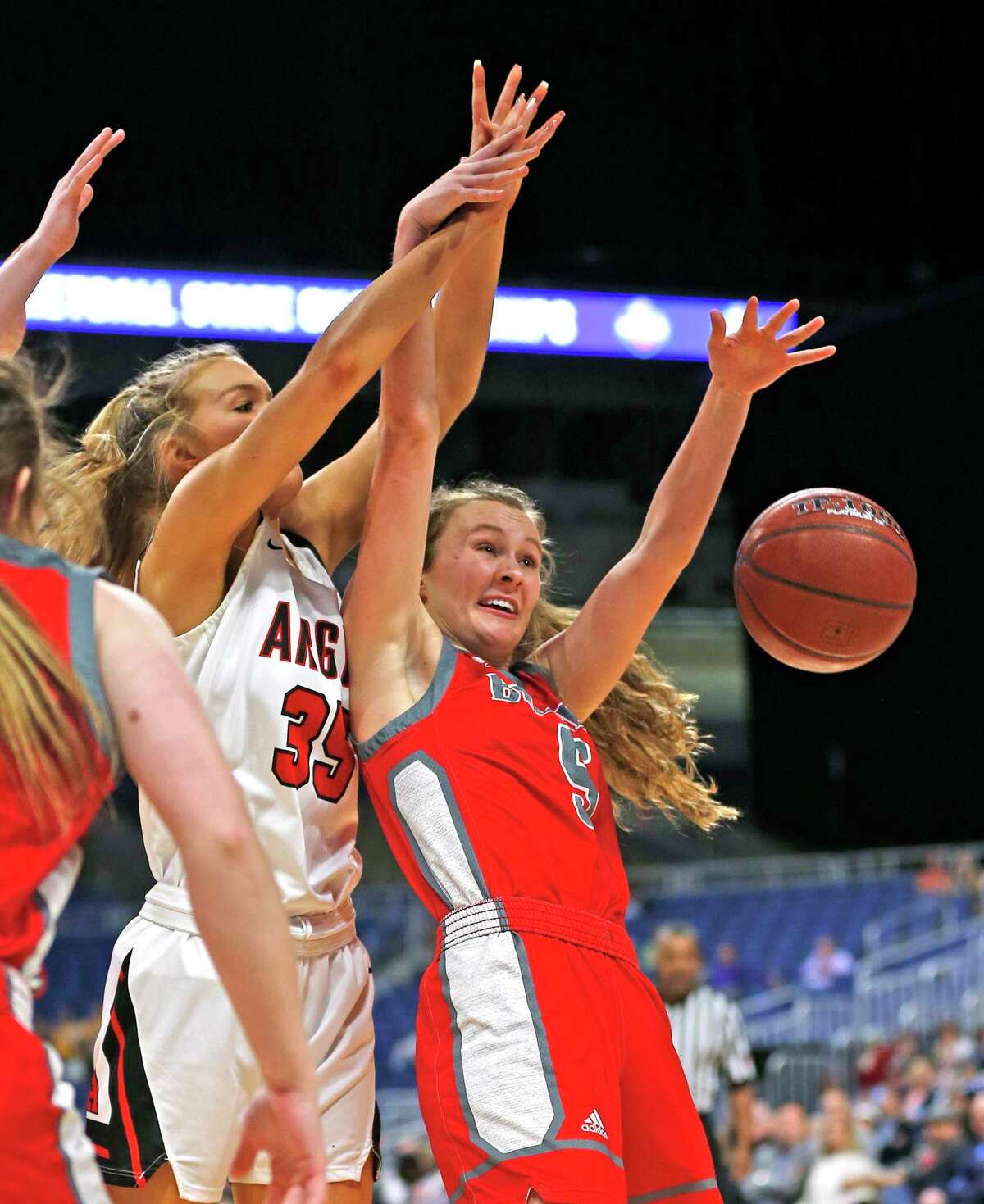 Argyle forward Shelby Henches #35 battles Fredericksburg forward Caitie Huff #5 in Class 4A state semifinal where Argyle defeated Fredericksburg 49-38 on Friday, March 6, 2020 at the Alamodome. (Ron Cortes/Contributor)