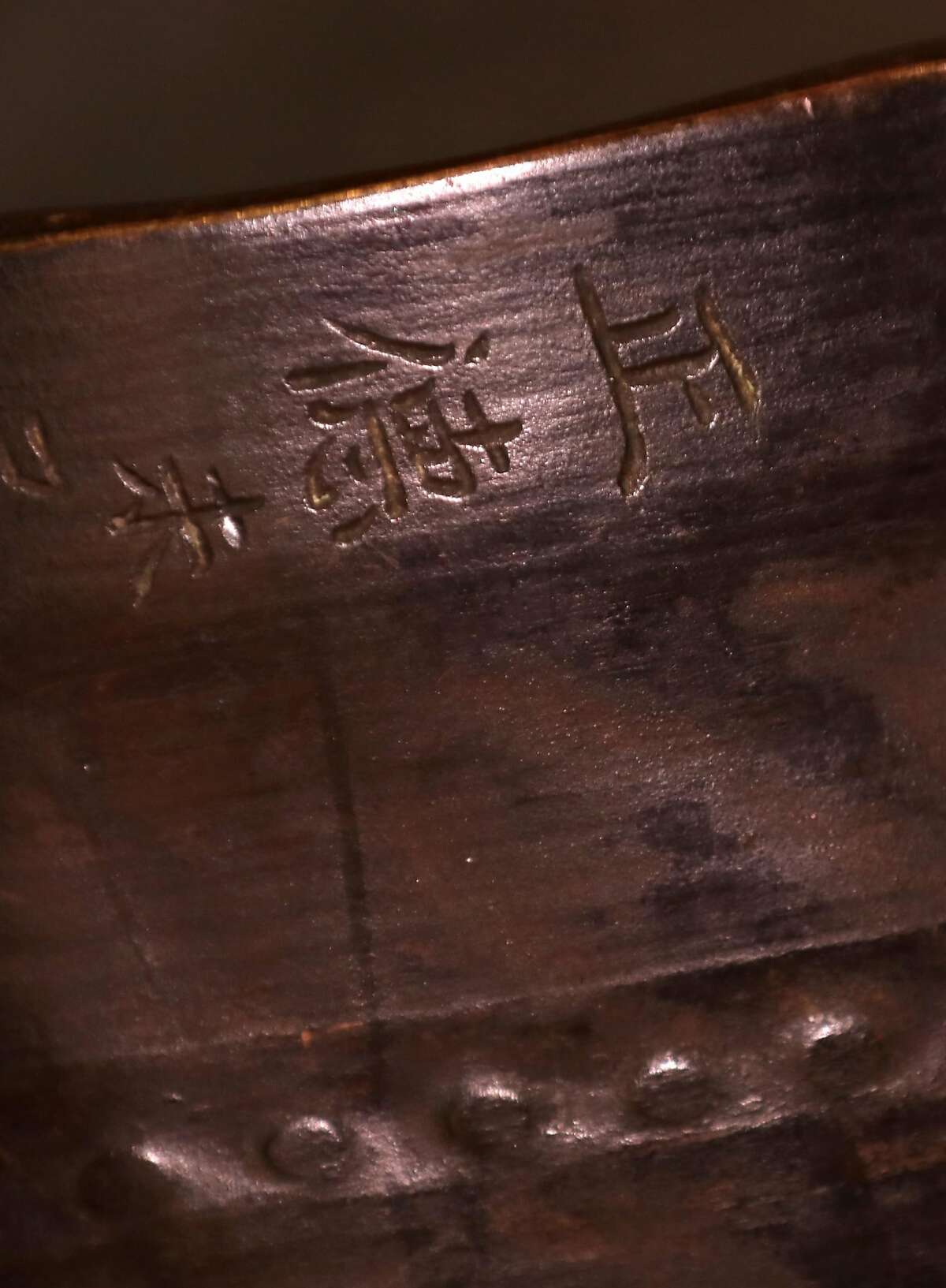 Detail of a gong used for meditation dated 1858 with writing meaning virtuous and righteous seen at the Swedenborgian church on Friday, March 6, 2020, in San Francisco, Calif. It is the 125th anniversary of national and historic landmark Swedenborgian Church.