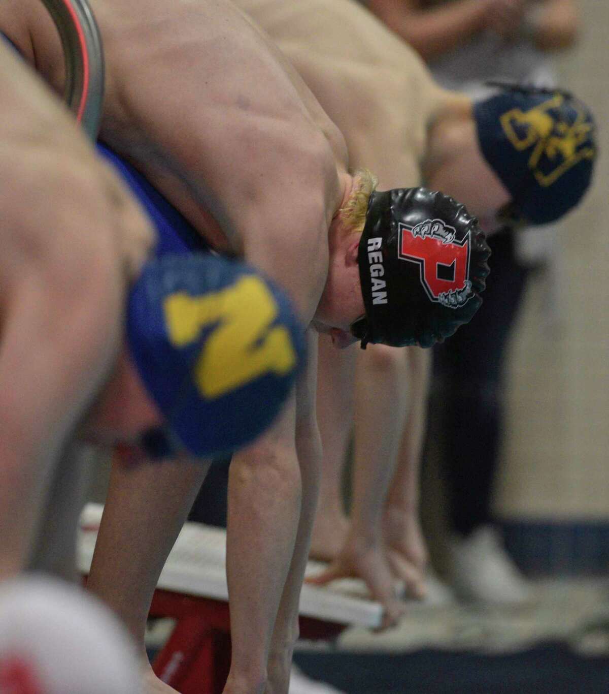 Timothy Regan, Pomperaug High School, on the starting block for the 200 Yard Freestyle during the SWC boys swimming championships, Friday night, March 6, 2020, at Masuk High School, Monroe, Conn.