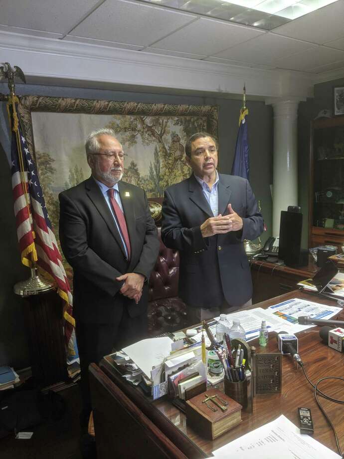  Rep. Henry Cuellar and Health Department Director Hector F. Gonzalez are pictured at a press conference Friday speaking about the $8.3 billion coronavirus supplemental bill passed by congress. Photo: Foto De Cortesía