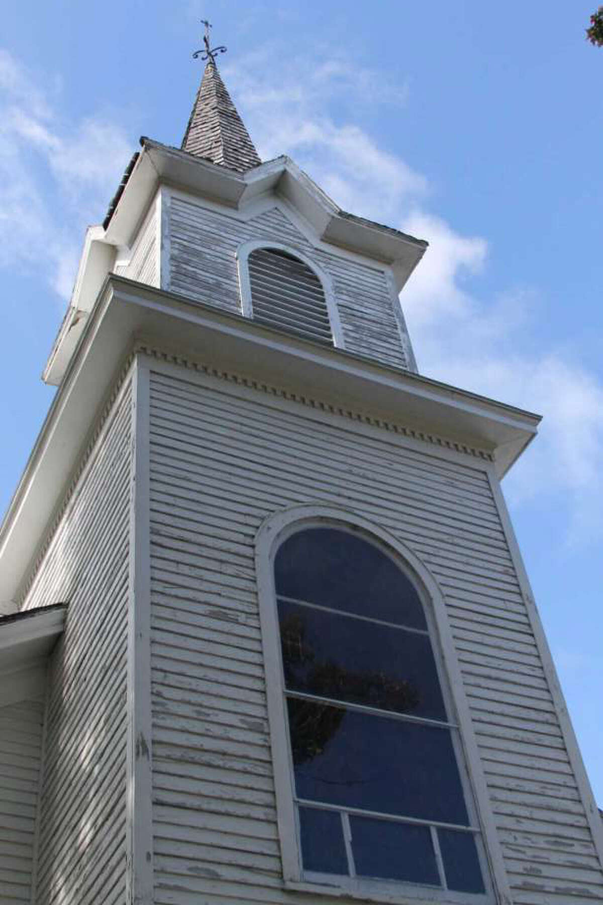 Our Savior's Historic Society members hope to have the historic Old Kirke museum fully repainted this year. Although the project is mostly complete, a work platform is needed to finish painting the steeple.
