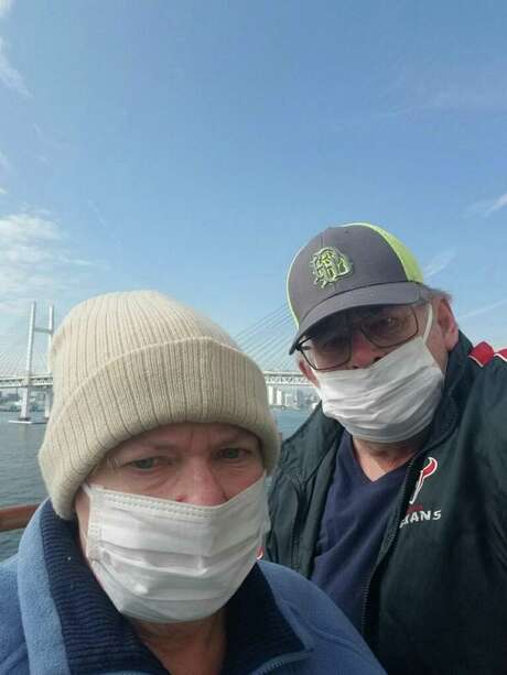 Terri and Dave Feil of Houston, shown aboard the Diamond Princess cruise ship while it was docked at a port in Japan. They would be ordered to stay for two weeks in isolation at Joint Base San Antonio-Lackland. Photo: /Courtesy Of The Feils