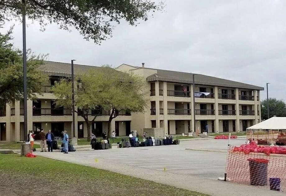 The evacuees stayed in a hotel at Joint Base San Antonio-Lackland. Most were cleared to leave the quarantine on Monday, March 2, 2020. They had packed and carried their suitcases outside before being told they would not be discharged that day. Photo: /Courtesy Of Terri Feil