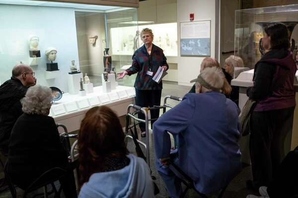 Susanne O’Brien, a docent at the San Antonio Museum of Art, describes the depiction of the Greek goddess Nike during a sensory tour on Saturday, March 7, 2020.