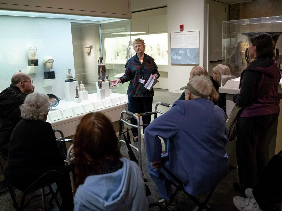 Susanne O’Brien, a docent at the San Antonio Museum of Art, describes the depiction of the Greek goddess Nike during a sensory tour on Saturday, March 7, 2020.
