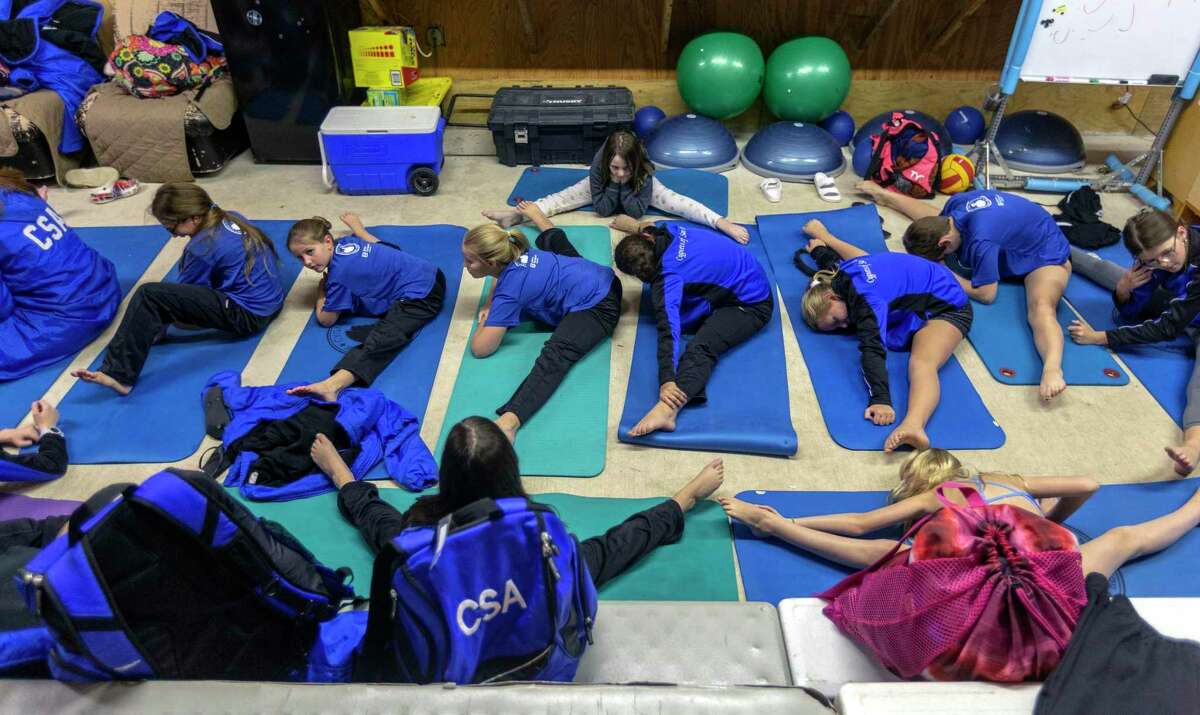 San Antonio girl swimmers have their timing just right