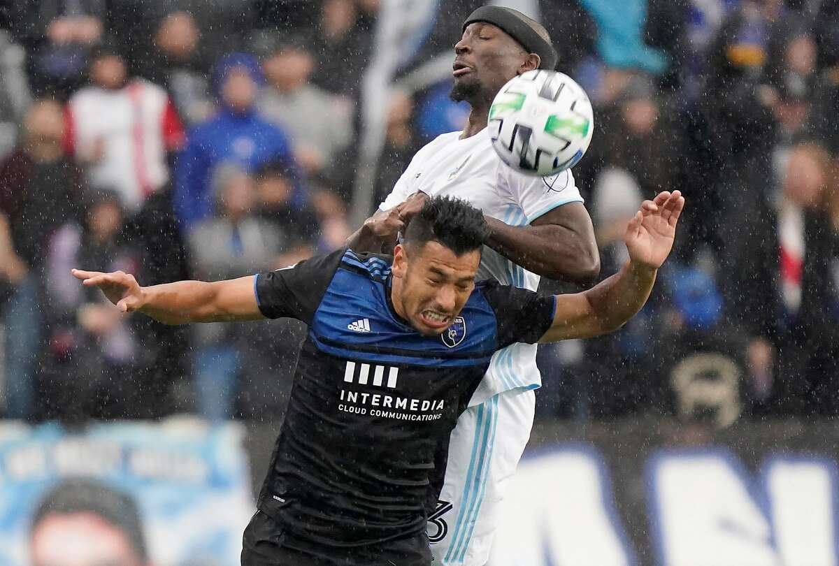 SAN JOSE, CALIFORNIA - MARCH 07: Andres Rios #25 of San Jose Earthquakes hits a header over the top of Ike Opara #3 of the Minnesota United FC during the first half of their MLS Soccer game in the first half at Earthquakes Stadium on March 07, 2020 in San Jose, California. (Photo by Thearon W. Henderson/Getty Images)