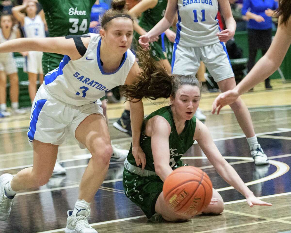 Saratoga senior Dolly Cairns and Shenendehowa junior Meghan Huerter scramble for a loose ball in the Section II, Class AA finals at Hudson Valley Community College in Troy NY on Saturday, March 7, 2020 (Jim Franco/Special to the Times Union.)