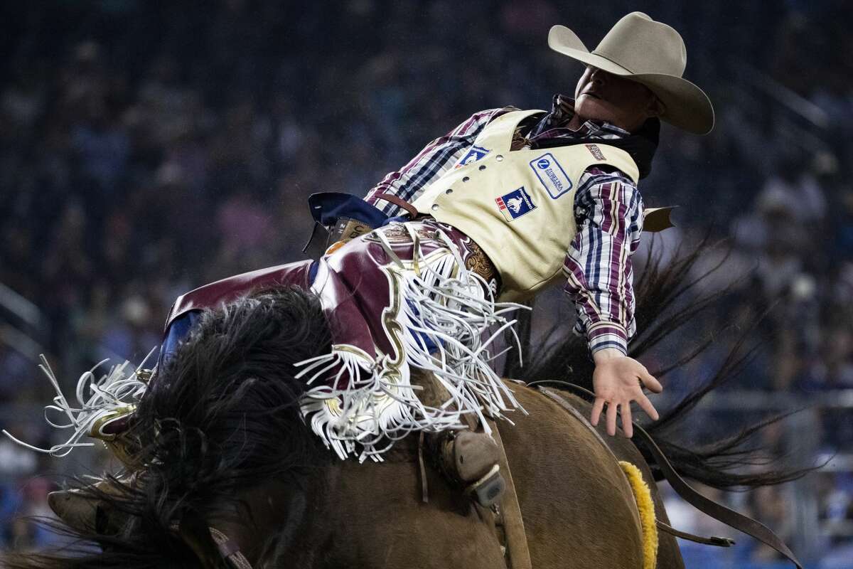 Zach Hibler competes in the Super Series II Championship Round bareback riding competition on Sunday, March 8, 2020, in Houston.