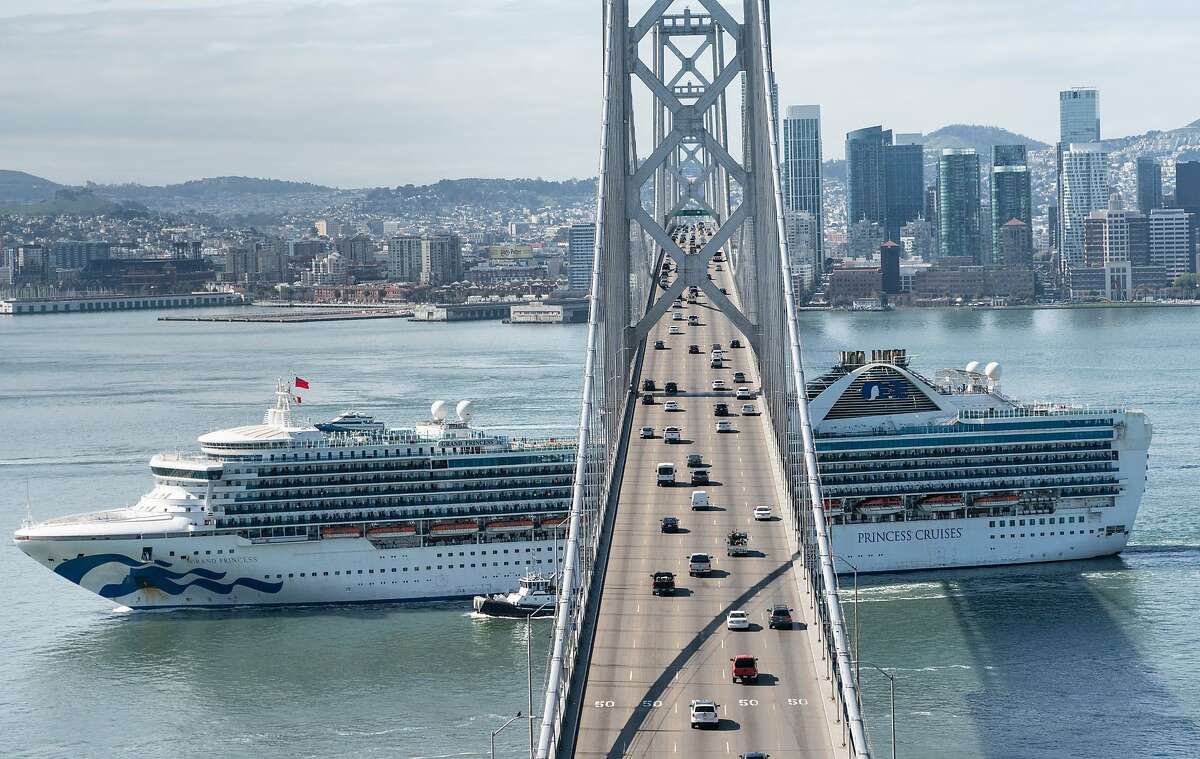 The Grand Princess heads to the Port of Oakland for quarantine due to the coronavirus on Monday, March 9, 2020, in Treasure Island, Calif.