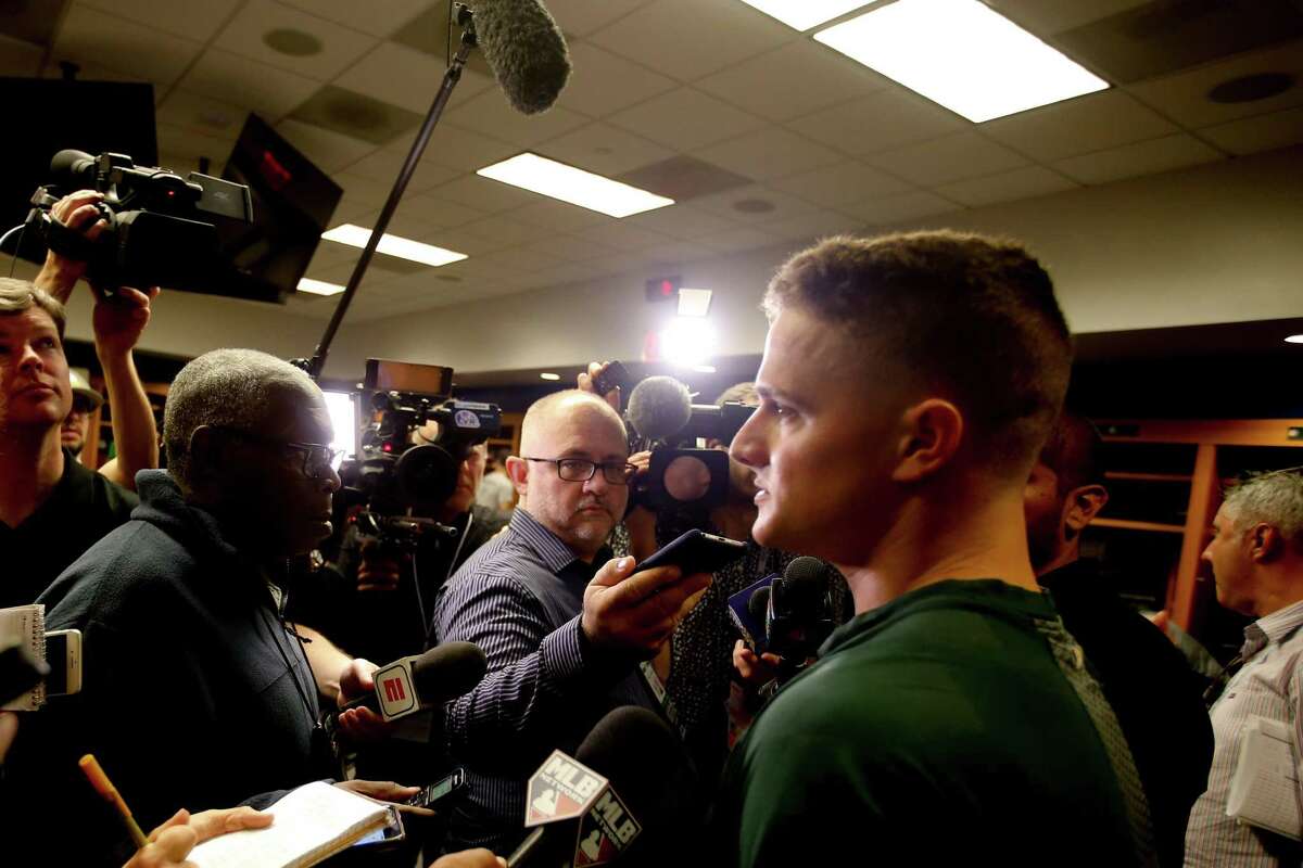NEW YORK, NY - OCTOBER 3: Matt Chapman #26 of the Oakland Athletics talks with the media in the clubhouse following the game against the New York Yankees in the American League Wild Card Game at Yankee Stadium on October 3, 2018 New York, New York. The Yankees defeated the Athletics 7-2. Zagaris/Oakland Athletics/Getty Images)