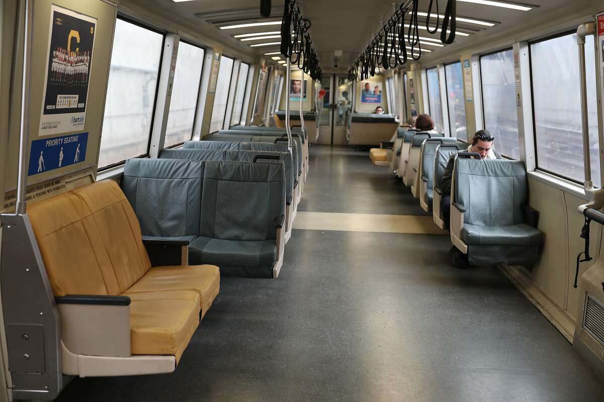 A near empty BART car passing Daly City with near empty seats heading to the airport seen on Monday, March 9, 2020, in San Francisco, Calif.
