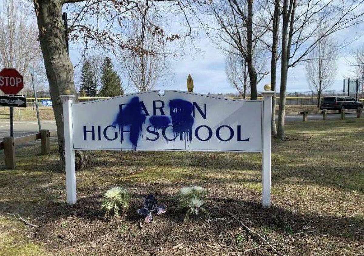 A sign outside Darien High School was vandalized over the weekend. Darien Police are investigating.