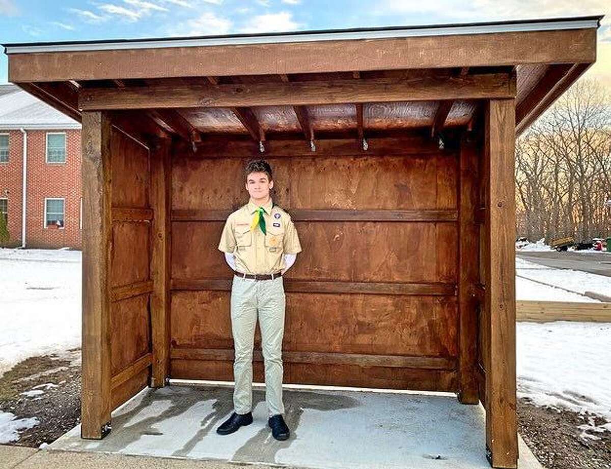 Trumbull High School senior Ben Cousins recently completed a bus shelter at Stern Village. The shelter, which was the final Eagle Scout project from Trumbull Troop 268, took nearly 300 hours to build.