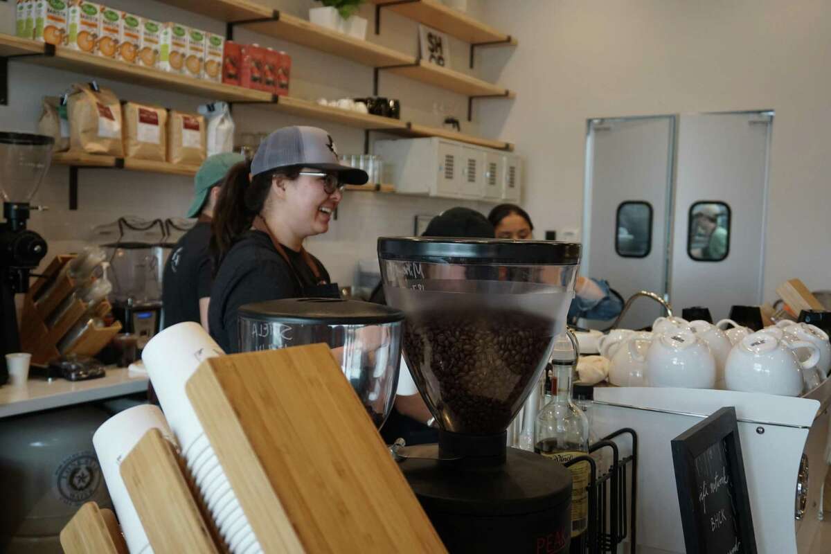 Blockhouse Coffee & Kitchen is now open in Katy at 9910 Gaston Road, Suite 170, in the Stableside at Falcon Landing shopping center. Here, Barista Shiela Sorenson has fun as she works on Saturday, March 7.
