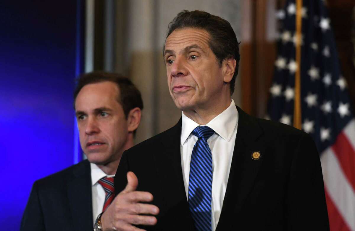 Gov. Andrew Cuomo, right, and State Department of Health Commissioner Dr. Howard Zucker, left, answers questions during a news briefing where he provided updates on state coronavirus infections, and measures being taken to mitigate its dispersion on Tuesday, March 10, 2020, in the Red Room at the Capitol in Albany, N.Y. (Will Waldron/Times Union)