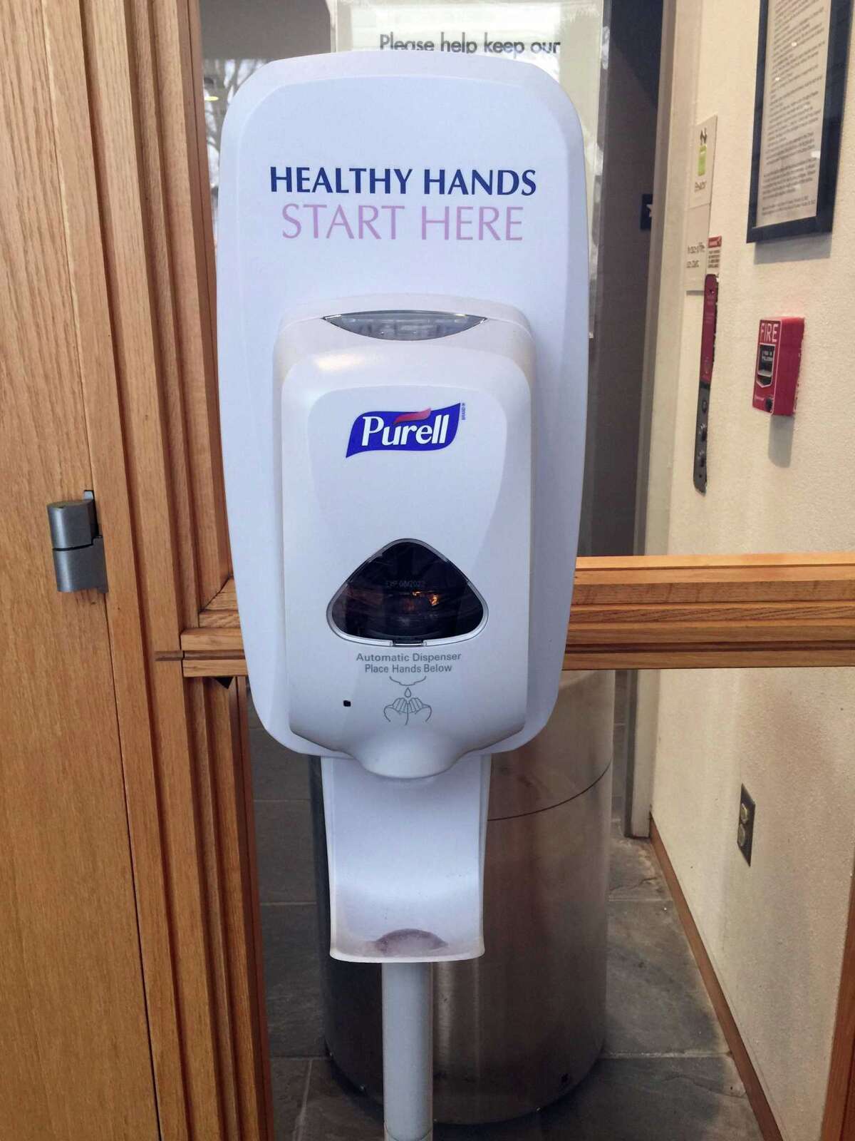 To prevent the spread of coronavirus, a public hand sanitizer dispenser is in service at Wilton Library.