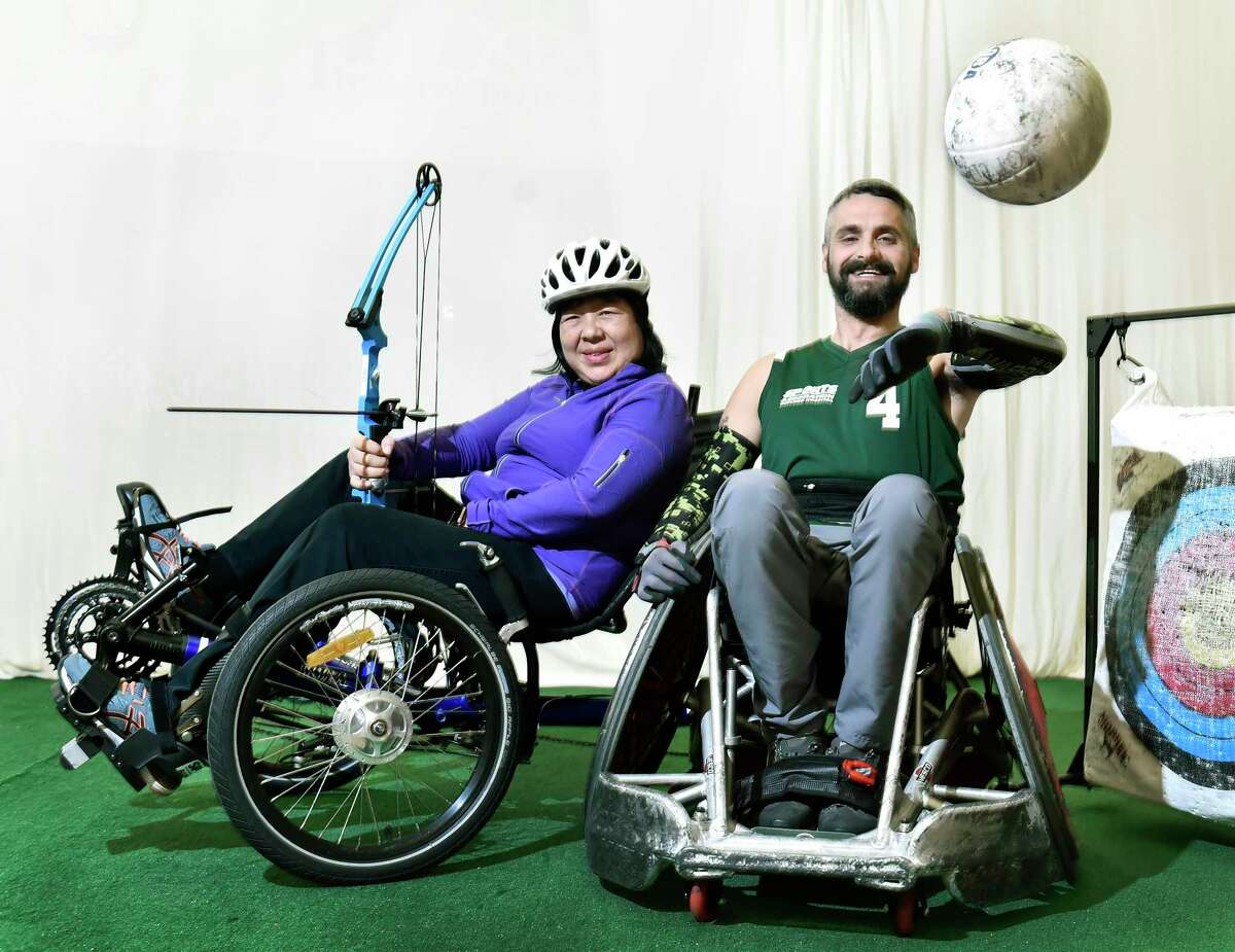 Adaptive sports athletes Eileen Hasson, 54, of Rocky Hill, left, and Brett Smith, 35, of Simsbury, belong to the Gaylord Sports Association at Gaylord Specialty Health Care in Wallingford. Hasson suffered a stroke four-years-ago and Smith became paralyzed after an accident five-years-ago. Hasson participates in various sports including bicycling and archery. Smith participates in adaptive rugby.