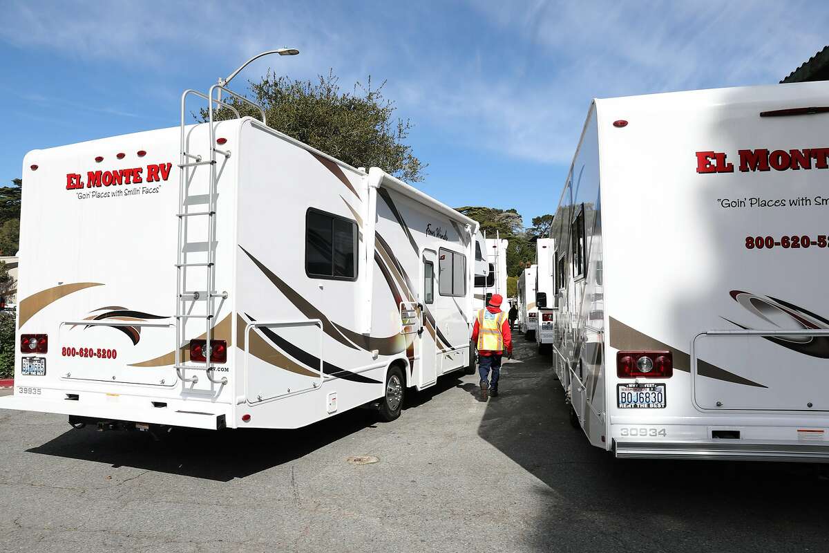About thirty RVs are being rented to house people diagnosed with COVID-19 if they have no other place where they can safely self-quarantine seen at the Presidio on Tuesday, March 10, 2020, in San Francisco, Calif.