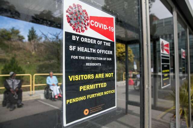 A sign outside Laguna Honda Hospital warns the public that visitors aren’t allowed during the coronavirus outbreak.