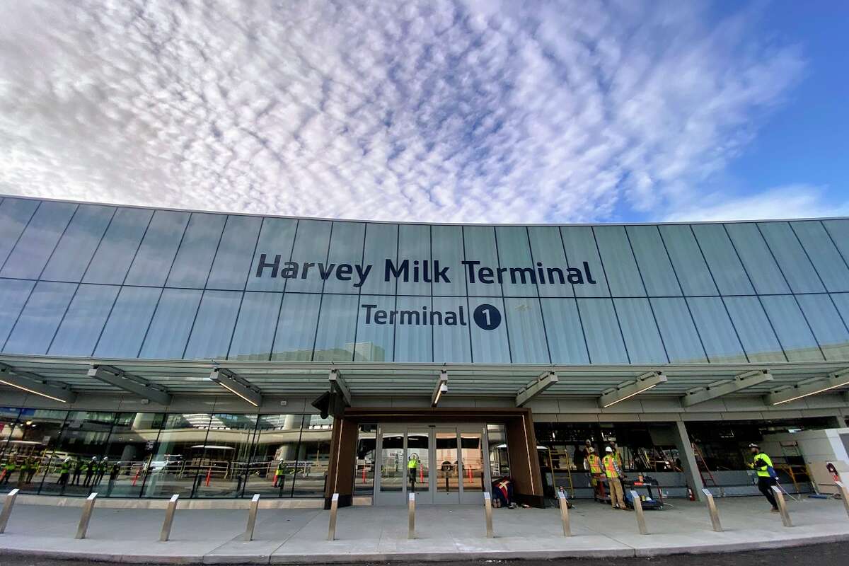 The lettering in the terminal sign is not painted-- instead it is baked into the layers of the glass fronting the roadway.