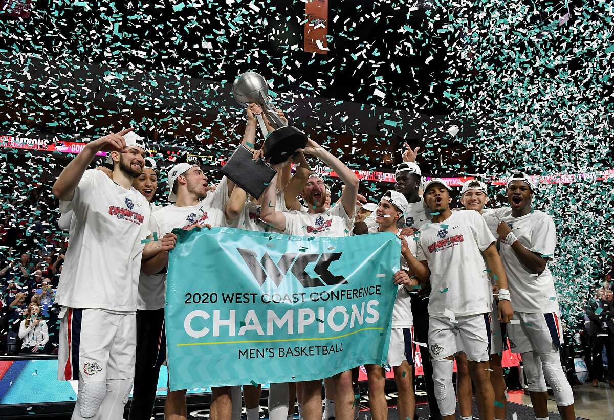 The Gonzaga men celebrate their WCC tournament championship after beating Saint Mary’s 84-66 at the Orleans Arena on March 10.