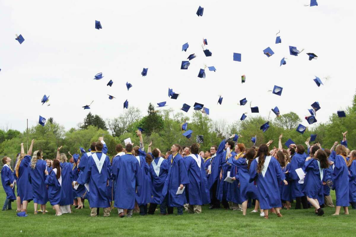 Students in the Morley Stanwood High School class of 2018 threw their caps in the air during graduation. During the 2018-19 school year, 87.10% of students graduated from the district in four years. (Herald Review file photo)