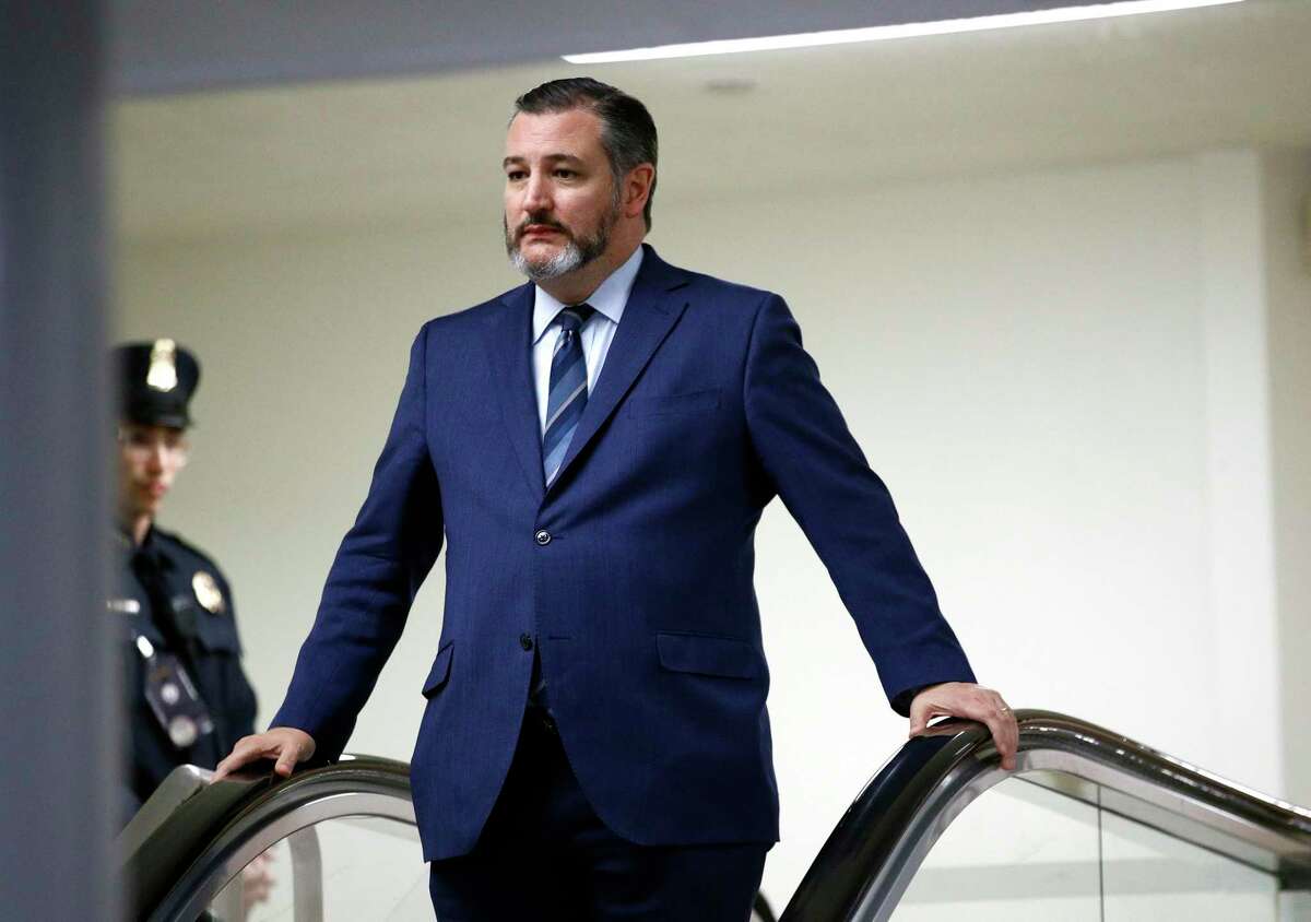 In this Jan. 29, 2020, file photo, Sen. Ted Cruz, R-Texas, rides an escalator before speaking with reporters on Capitol Hill in Washington. GOP Sen. Cruz said Sunday, March 8, 2020, he will remain at his home in Texas after learning that he shook hands and briefly chatted with a man in suburban Washington who has tested positive for coronavirus.