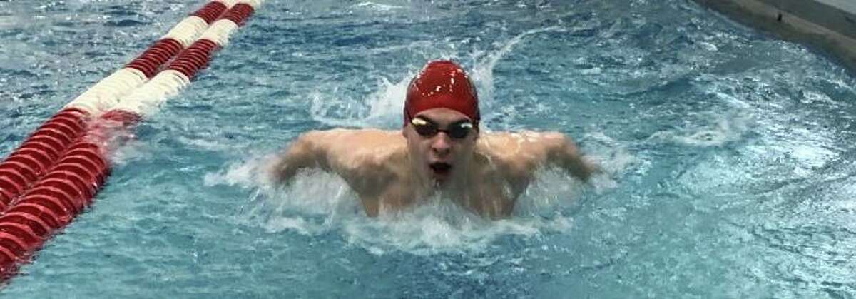 Edward Platonov won his fourth SCC title when he placed first in the backstroke at SCSU.