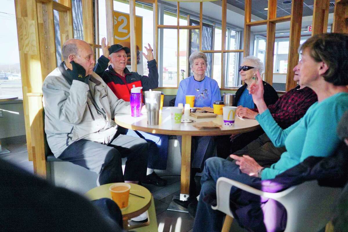 From left to right, Chuck Clark of Gansevoort, George Bourdeau of South Glens Falls, Pete Sweet of South Glens Falls, Fran Many of South Glens Falls, John Schaffer of Moreau and Nancy Nicholson of Queensbury talk about what they felt at their homes during the earthquake as they met for their morning coffee on Wednesday, March 11, 2020, in South Glens Falls, N.Y. A minor earthquake measuring 3.1-magnitude on the Richter scale shook the area Wednesday morning. (Paul Buckowski/Times Union)