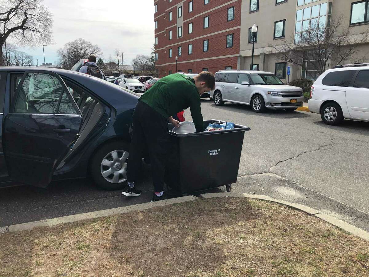 Southern Connecticut State University student Joe Bernard prepares to return home to New Hampshire on Wednesday, March 11. Classes were canceled and students were told to leave the residence halls due to coronavirus concerns. Classes will be held online from March 23 through at least April 5.