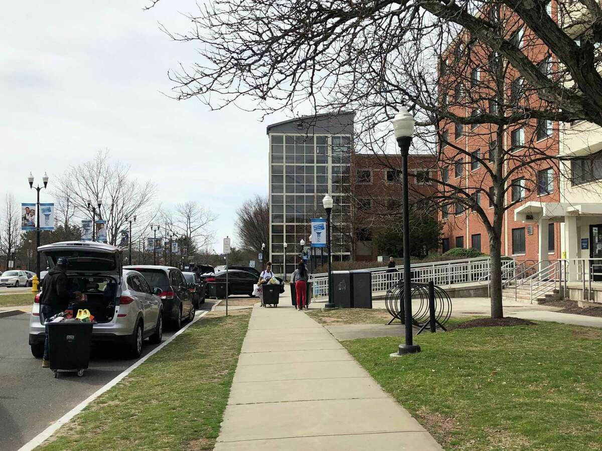Students prepare to leave Southern Connecticut State University student on Wednesday, March 11. Classes are canceled and students were told to leave the residence halls due to coronavirus concerns. Classes will be held online from March 23 through at least April 5.