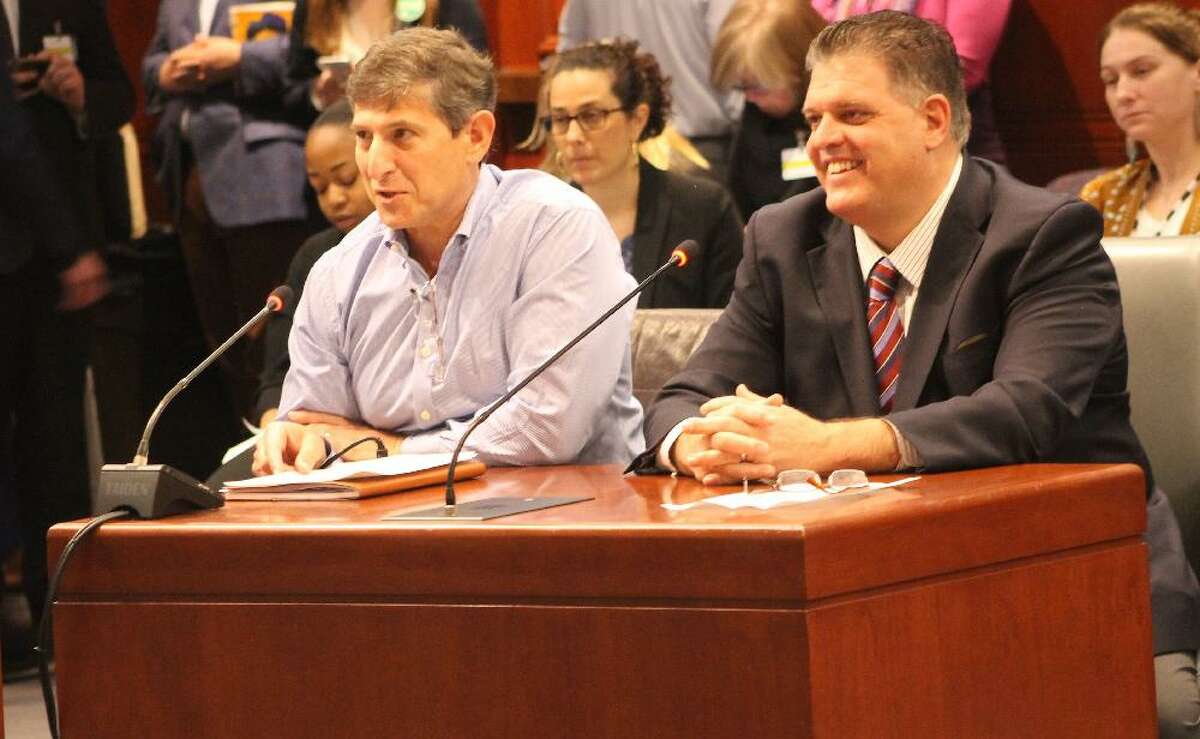 State Rep. David Rutigliano is joined by Board of Finance member Marty Isaac during a public hearing about later school starting times.