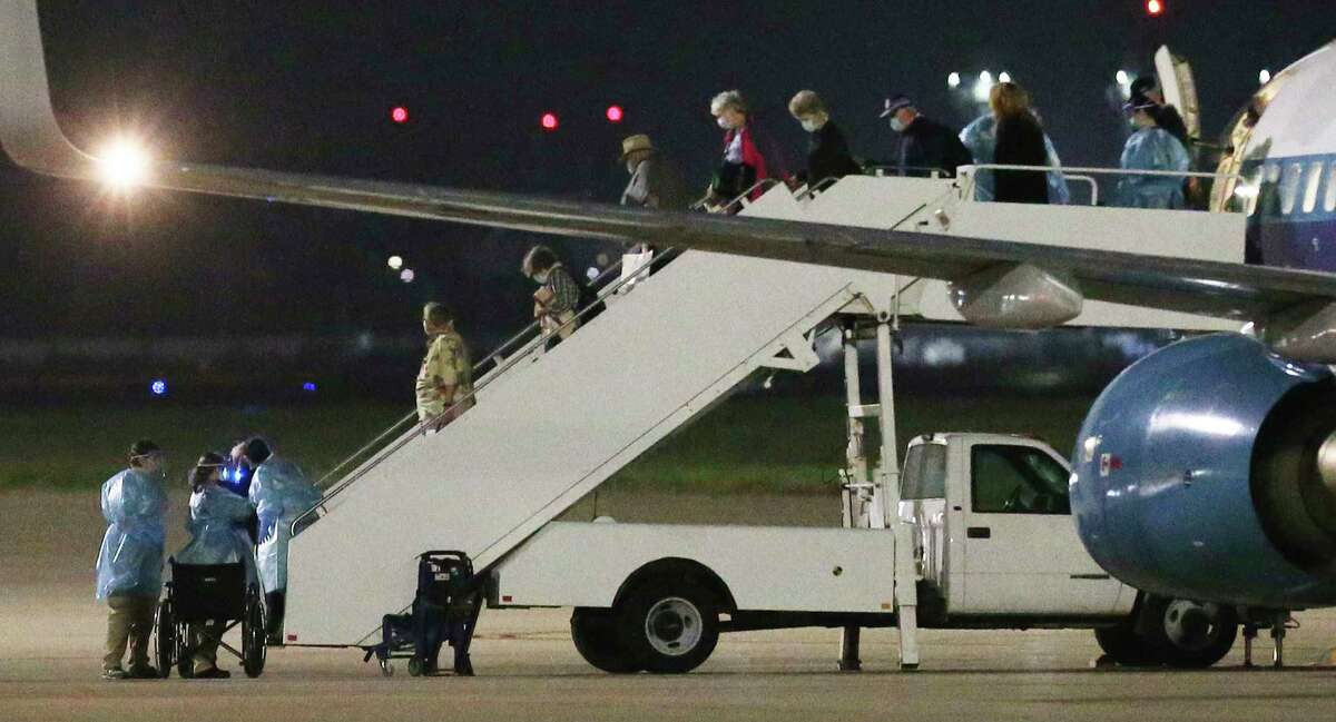A second charter flight from Oakland carrying passengers evacuated from the Grand Princess cruise ship arrives at Joint Base San Antonio-Lackland at about 4:48 a.m. on Thursday, March 12, 2020.