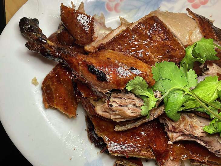 Crispy duck comes from the separate Chinese specialty menu at Phoenix Chinese Cafe.