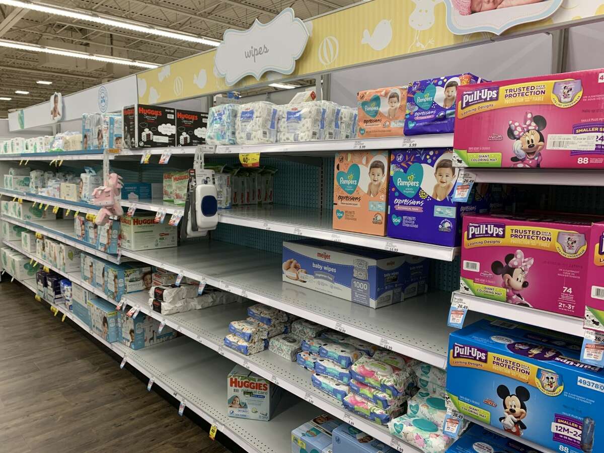 Shelves of tissues, paper towels, toilet and cleaning products are being emptied at the Meijer department store, located at 7300 Eastman Avenue, as Midland residents prepare for a potential outbreak of Coronavirus disease on March 12, 2020. (Mitchell Kukulka/Mitchell.Kukulka@mdn.net)