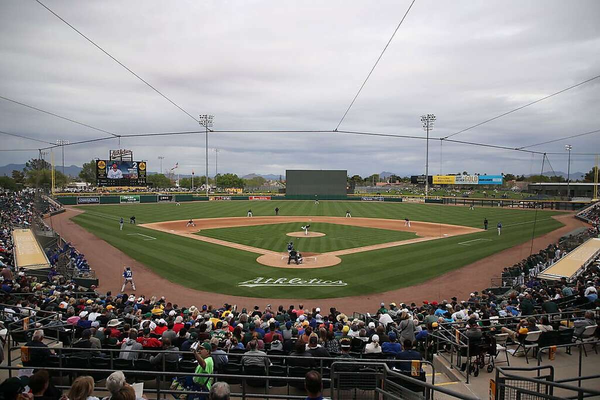 MESA, ARIZONA - MARCH 10: General view of action as starting pitcher Mike Fiers #50 of the Oakland Athletics pitches against the Kansas City Royals during the third inning of the MLB spring training game at HoHoKam Stadium on March 10, 2020 in Mesa, Arizona. (Photo by Christian Petersen/Getty Images)