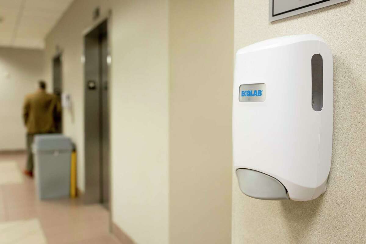 Two hand sanitizer dispensers were recently put in place at the Lee G. Allworth building in Conroe as a precautionary measure against the spread of COVID-19, Thursday, March 12, 2020. Due to the public response of COVID-19 the courthouse has been unable to purchase hand sanitizer for the dispensers.