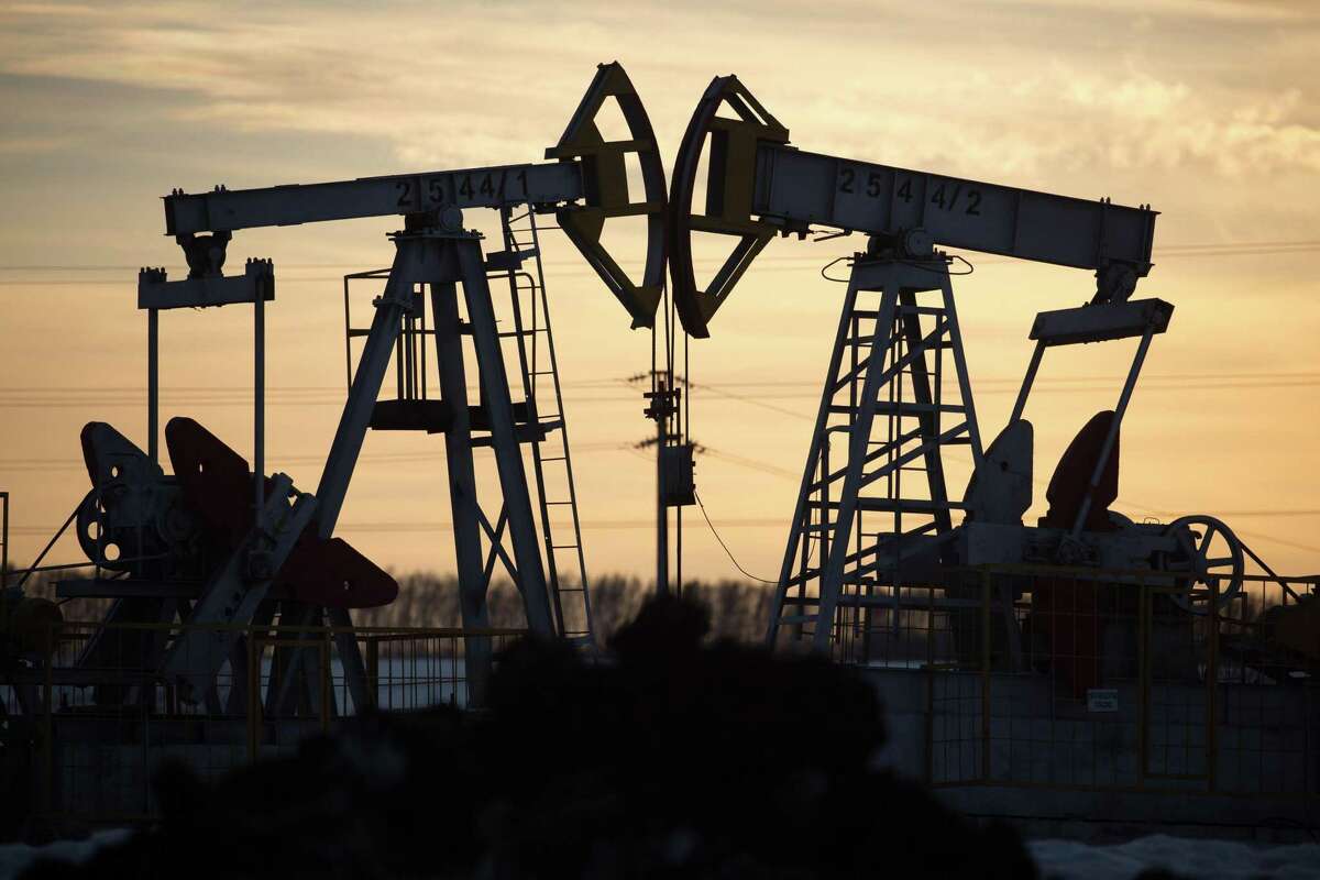 Oil pumping jacks, also known as "nodding donkeys", operate in an oilfield near Almetyevsk, Tatarstan, Russia, on Wednesday, March 11, 2020. Saudi Aramco plans to boost its oil-output capacity for the first time in a decade as the world’s biggest exporter raises the stakes in a price and supply war with Russia and U.S. shale producers. Photographer: Andrey Rudakov/Bloomberg