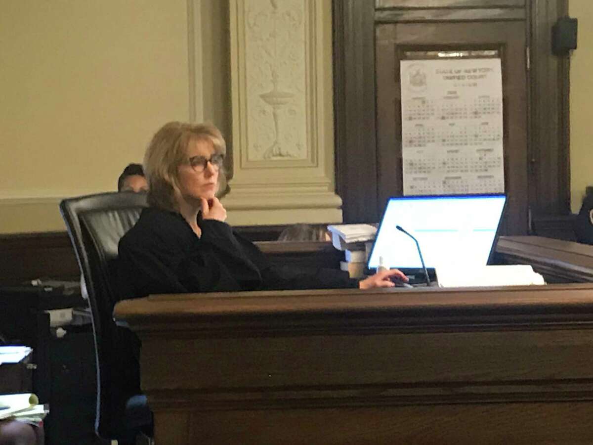 Rensselaer County Court Judge Debra Young listens to openings during the murder trial of James White in Troy, N.Y. on Friday March 13, 2020.