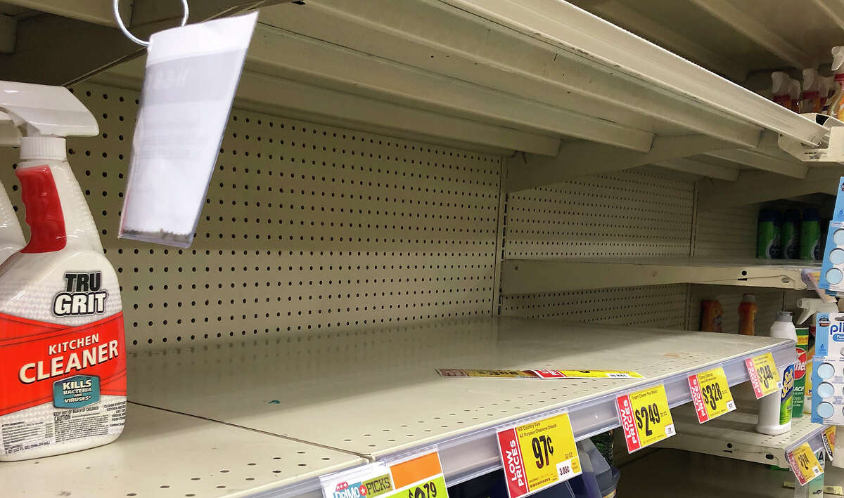 Disinfectants and other cleaning essentials sell out temporarily, despite rationing, at H-E-B amid growing COVID-19 cornonavirus concerns, Thursday, Mar. 12, 2020.