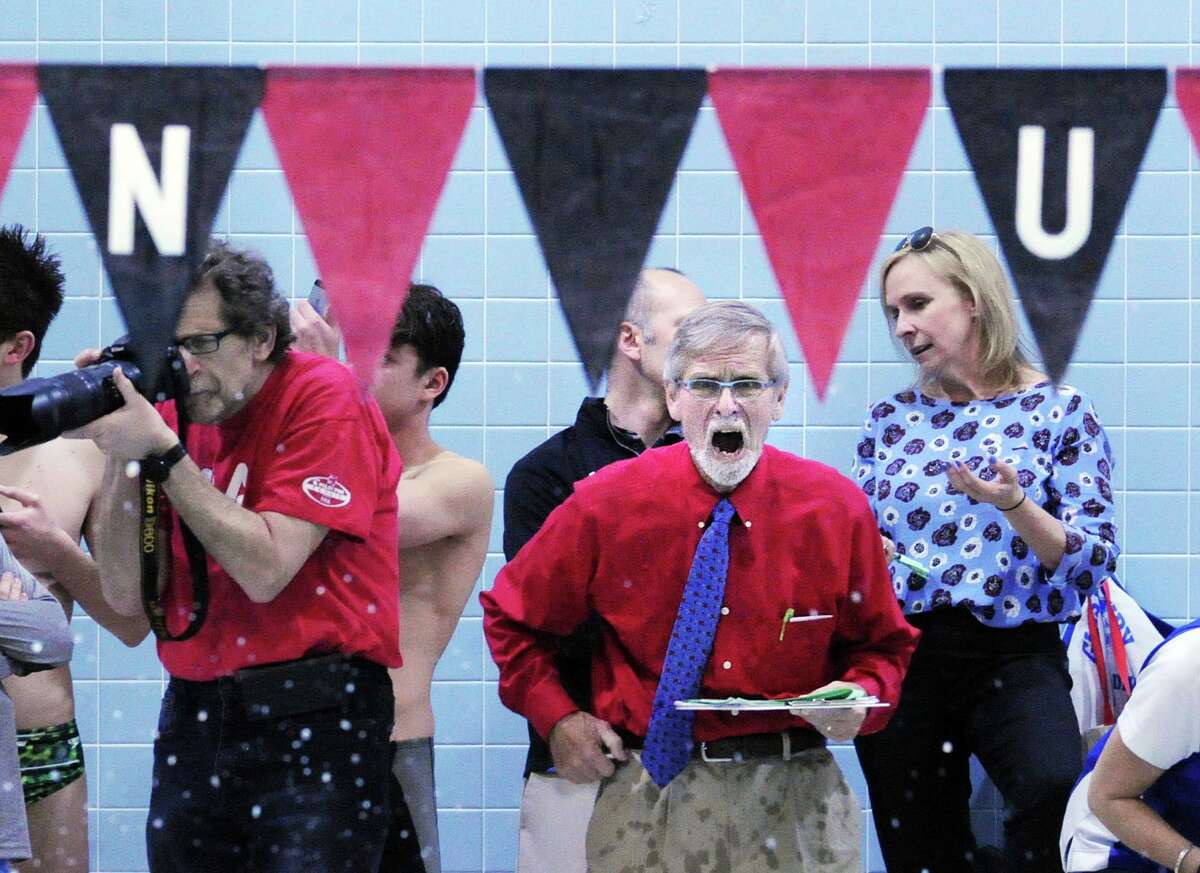 Greenwich swim coach Terry Lowe cheers for his swimmer Alex Jahan of Greenwich who was competing in the 200 IM event that he won during the CIAC boys class LL swimming championships at Wesleyan University, Middletown, Conn., Wednesday, March 16, 2016.
