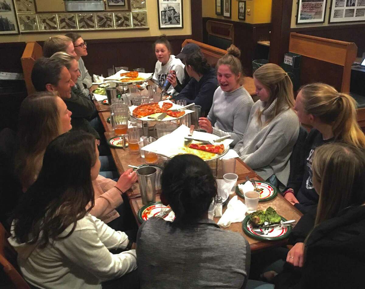 The Yale women's crew team gathered for a final meal at Yorkside Pizza and Restaurant in New Haven Saturday night, March 14, 2020, before dispersing for the year as the coronavirus crisis ended classes and sports on campus. Crowds were sparse throughout downtown, well beyond the normal lull from spring break.