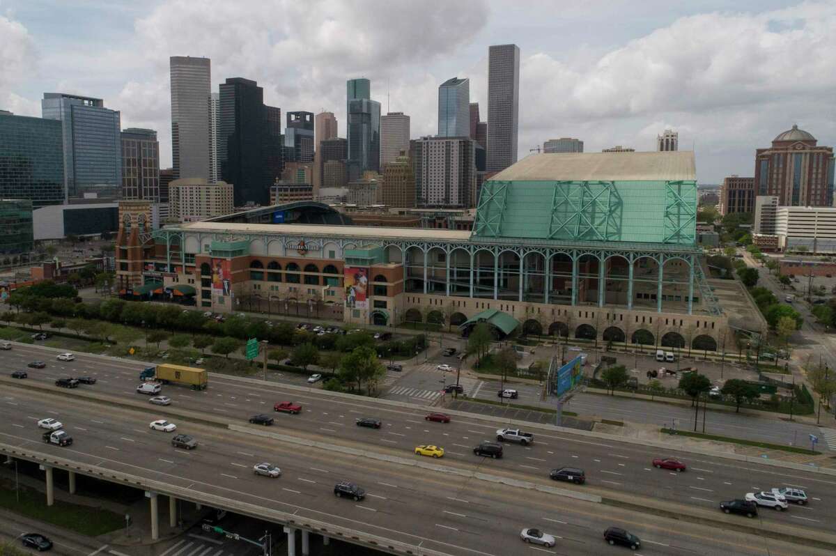 Traffic moves briskly along Interstate 69 near Minute Maid Park on March 13, 2020, in Houston.