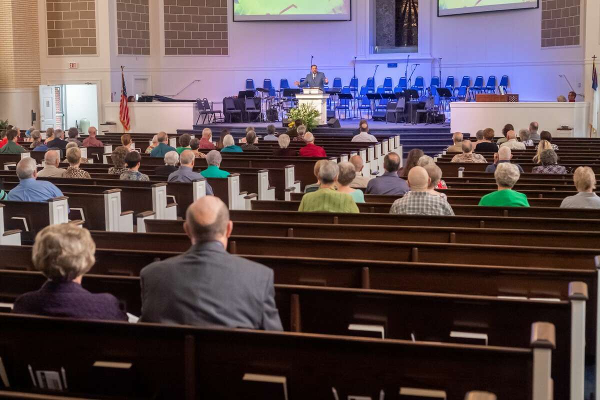 Rev. Jason Burden of First Baptist Church Nederland preaches to a much emptier church on Sunday, March 15, 2020 as many of his congregation watched the service online due to the coronavirus situation. Fran Ruchalski/The Enterprise