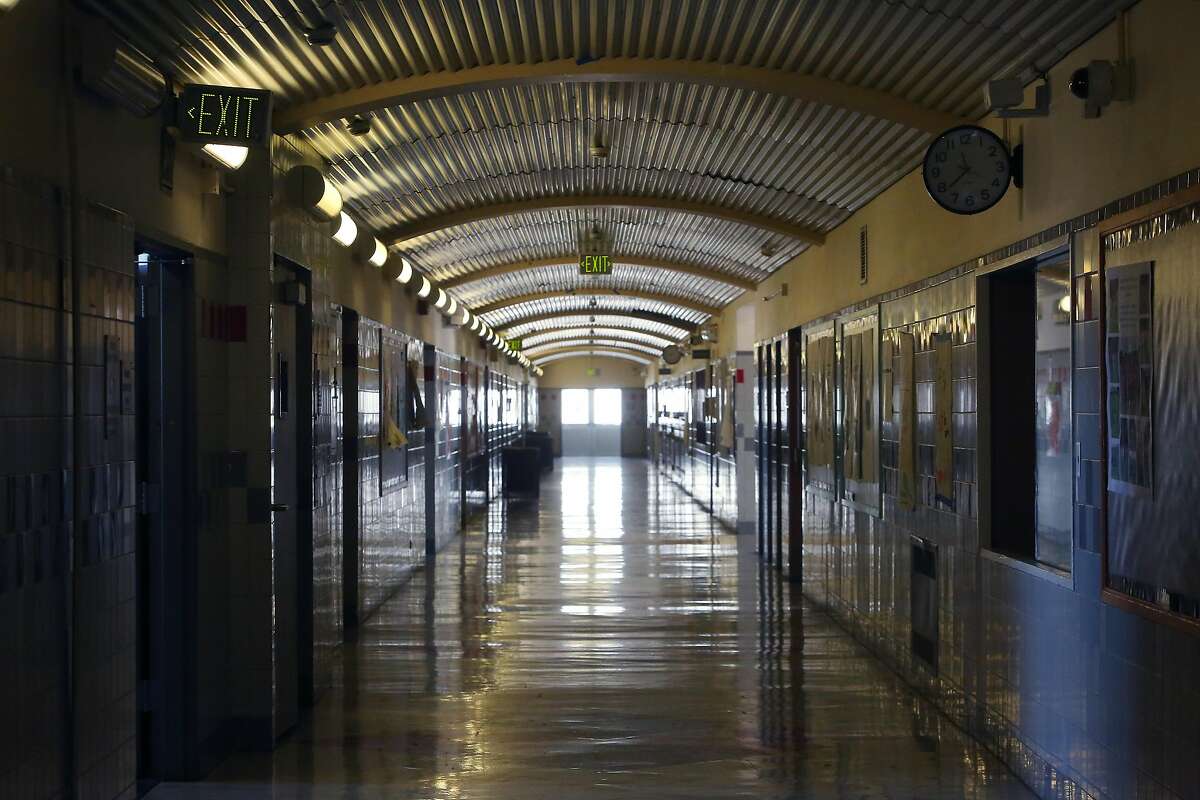 An empty corridor is seen at Thurgood Marshall Academic High School on Thursday, March 12, 2020 in San Francisco, Calif.