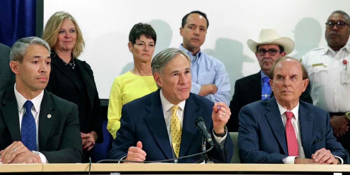 Gov. Greg Abbott, with Mayor Ron Nirenberg and County Judge Nelson Wolff, is shown in this March 16, 2020, photo. Wolff and Nirenberg believe a mandate requiring residents to wear masks when out in public is needed to help prevent the spread of the coronavirus. Although Abbott recommends wearing masks, he has stipulated that it should be voluntary.