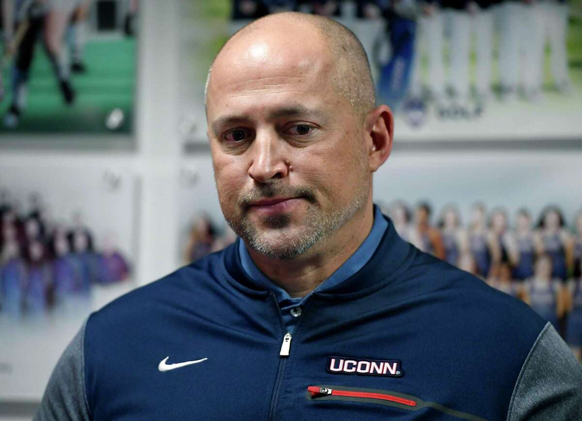 Connecticut athletic director David Benedict holds a news conference in his office at the University of Connecticut, Saturday, Jan. 19, 2019, in Storrs, Conn.  (AP Photo/Jessica Hill)