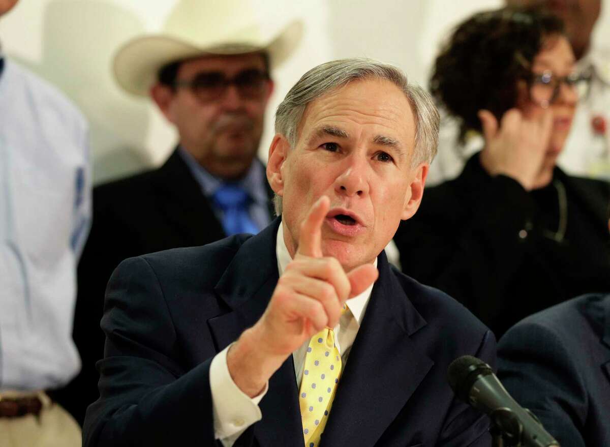 Texas Gov. Greg Abbott is joined by state and city officials as he gives an update on the coronavirus outbreak, Monday, March 16, 2020, in San Antonio. (AP Photo/Eric Gay)